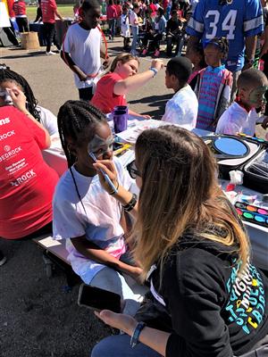 Getting my face painted 