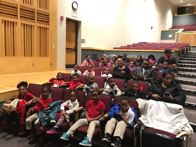 Excitedly waiting for the play to begin