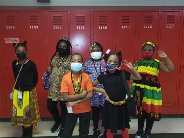 Students wearing African outfits