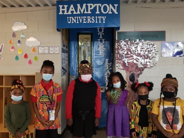 Students wearing African outfits