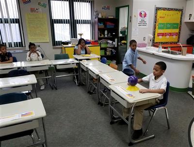 Coach G visits a fourth grade classroom and teach skills through gaming.