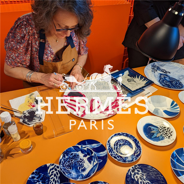 Crafter painting a plate